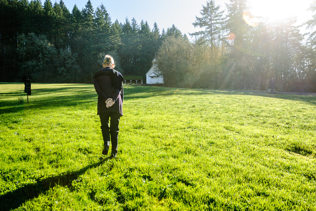 man walking in a field