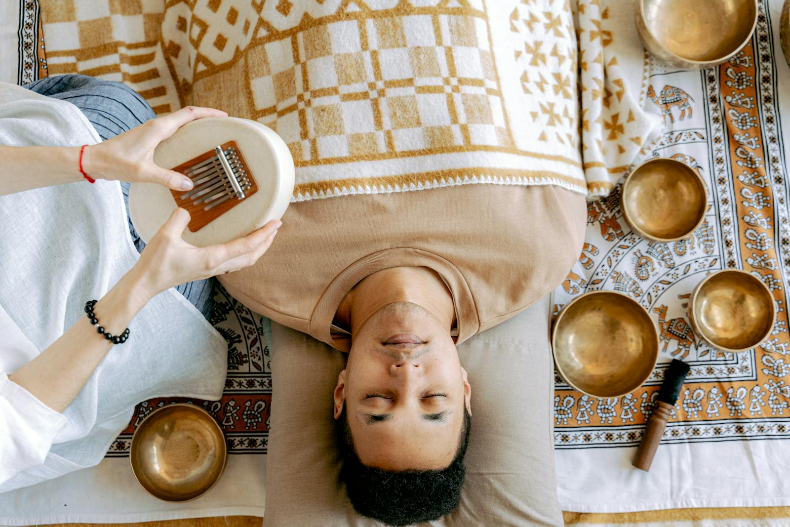 Man Relaxing with Sound bath meditation